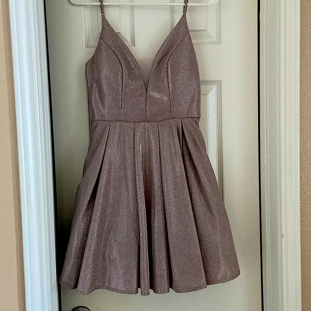 Sparkly metallic pink dress, perfect for Homecoming dances. Only worn once.